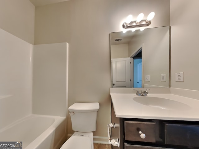 1162 Ida Woods Ln Unit 23, Lawrenceville, GA 30045 - full bathroom with toilet, vanity, baseboards, and shower / tub combination