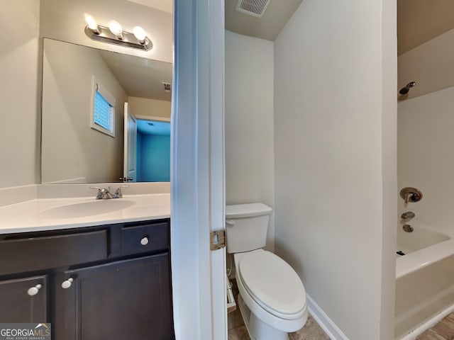 1162 Ida Woods Ln Unit 23, Lawrenceville, GA 30045 - bathroom featuring vanity, shower / bathtub combination, and toilet