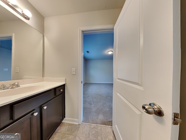 1162 Ida Woods Ln Unit 23, Lawrenceville, GA 30045 - bathroom with vanity and baseboards