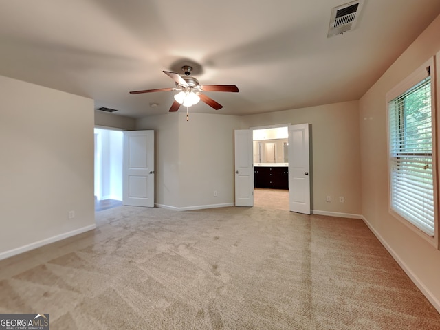 1162 Ida Woods Ln Unit 23, Lawrenceville, GA 30045 - empty room featuring ceiling fan, light carpet, and baseboards