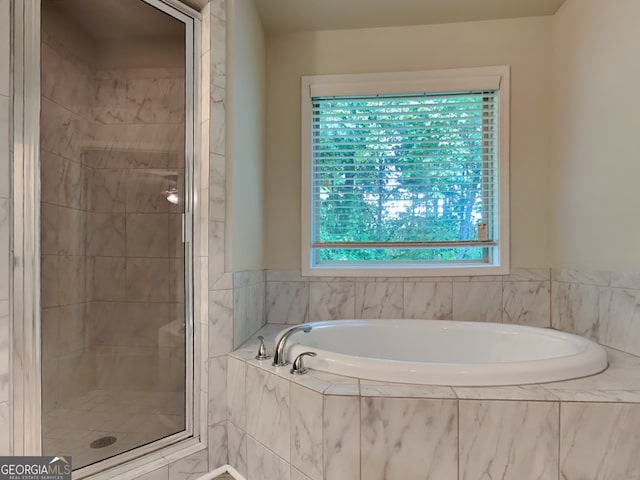 1162 Ida Woods Ln Unit 23, Lawrenceville, GA 30045 - bathroom featuring a shower stall and a garden tub
