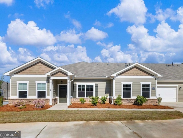 2959 Rambler Dr, Loganville, GA 30052 - craftsman inspired home with brick siding and a garage