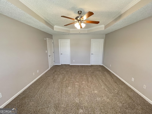 1365 Jubilee Ln, Mcdonough, GA 30253 - interior space featuring baseboards, a ceiling fan, a tray ceiling, and a textured ceiling