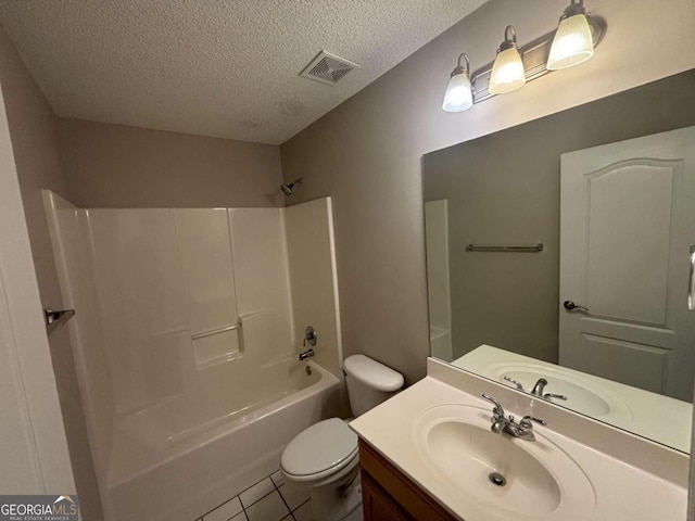 1365 Jubilee Ln, Mcdonough, GA 30253 - bathroom with tile patterned flooring, visible vents, toilet, vanity, and a textured ceiling