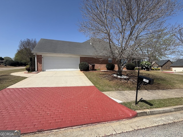 1365 Jubilee Ln, Mcdonough, GA 30253 - view of front of home with roof with shingles, a front lawn, driveway, a garage, and brick siding