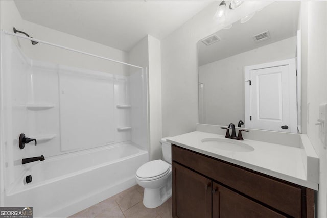 full bathroom featuring washtub / shower combination, tile patterned flooring, visible vents, toilet, and vanity