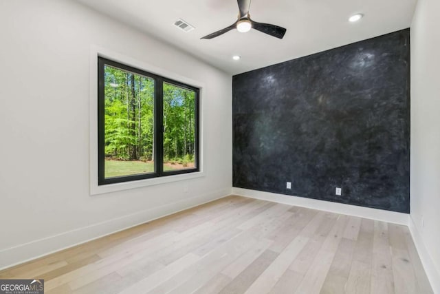 2205 Sugarloaf Pkwy, Lawrenceville, GA 30045 - empty room with wood finished floors, recessed lighting, and a ceiling fan