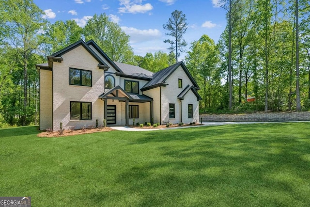 2205 Sugarloaf Pkwy, Lawrenceville, GA 30045 - view of front of home featuring a front yard