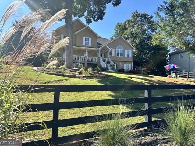 279 S Woods Ct, Jasper, GA 30143 - view of front of home with a porch