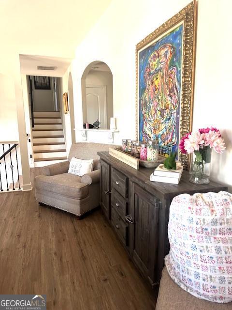 279 S Woods Ct, Jasper, GA 30143 - living area featuring dark wood-style flooring and stairway