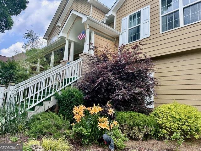 279 S Woods Ct, Jasper, GA 30143 - view of side of home featuring stairs