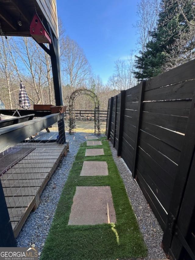 view of yard with fence