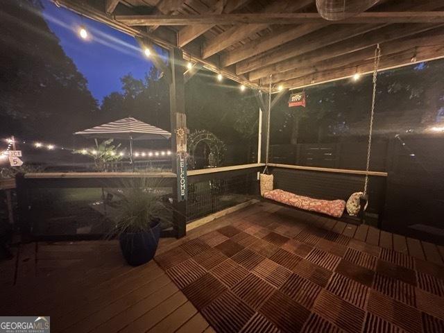 279 S Woods Ct, Jasper, GA 30143 - view of deck at night