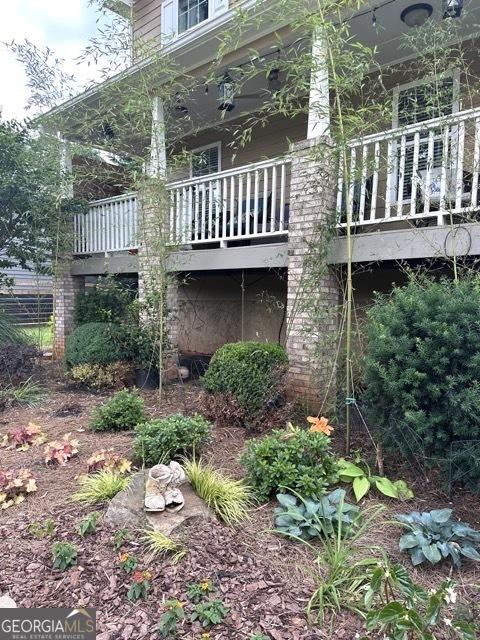 279 S Woods Ct, Jasper, GA 30143 - view of home's exterior with a balcony