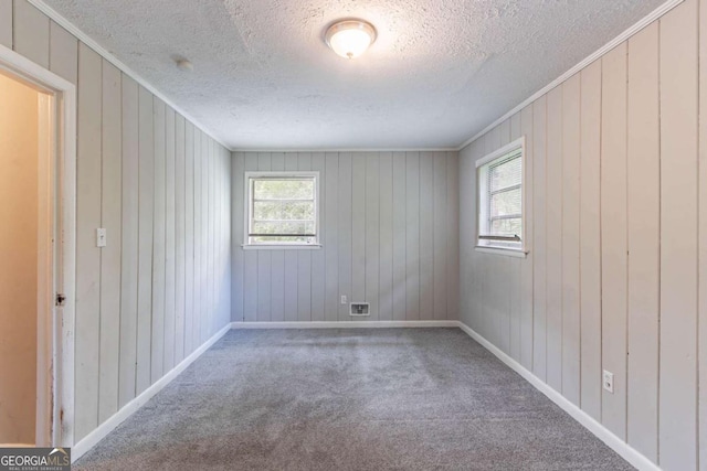 1956 Joseph Ct, Decatur, GA 30032 - carpeted spare room with a textured ceiling, baseboards, and ornamental molding