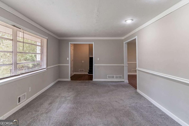 1956 Joseph Ct, Decatur, GA 30032 - spare room with baseboards, visible vents, carpet floors, and crown molding