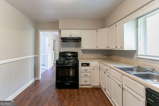 1956 Joseph Ct, Decatur, GA 30032 - kitchen with a sink, dark wood-style flooring, white cabinetry, under cabinet range hood, and black appliances