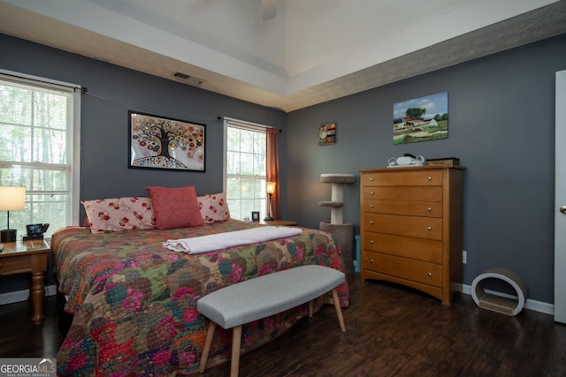 344 River Landing Dr, Monroe, GA 30656 - bedroom featuring wood finished floors, baseboards, and a raised ceiling