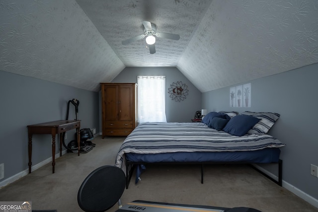 344 River Landing Dr, Monroe, GA 30656 - bedroom with light colored carpet, a textured ceiling, vaulted ceiling, a ceiling fan, and baseboards
