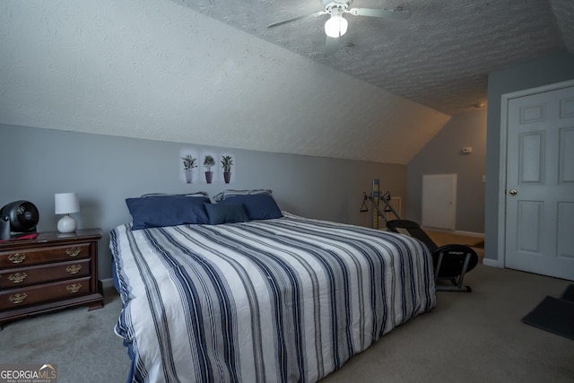 344 River Landing Dr, Monroe, GA 30656 - carpeted bedroom featuring a textured ceiling, lofted ceiling, and ceiling fan