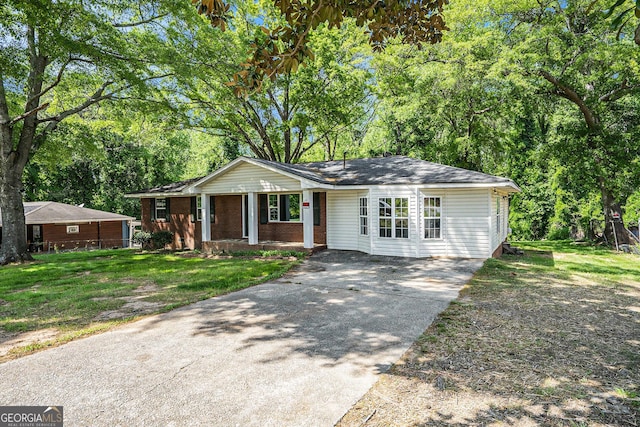 1132 Luther Dr SW, Mableton, GA 30126 - single story home with a front lawn, driveway, and covered porch