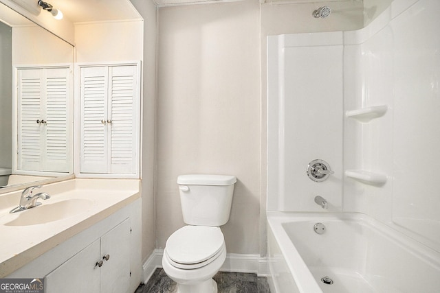 1132 Luther Dr SW, Mableton, GA 30126 - bathroom featuring shower / tub combination, baseboards, vanity, and toilet