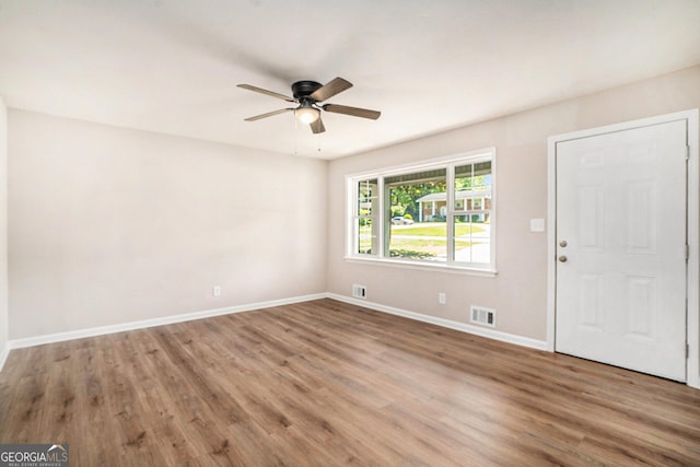 1132 Luther Dr SW, Mableton, GA 30126 - interior space featuring baseboards, wood finished floors, visible vents, and a ceiling fan