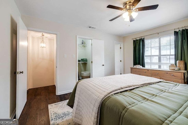 33 Hidden Lake Ct, Savannah, GA 31419 - bedroom with dark wood-style floors, ceiling fan, a closet, and a spacious closet