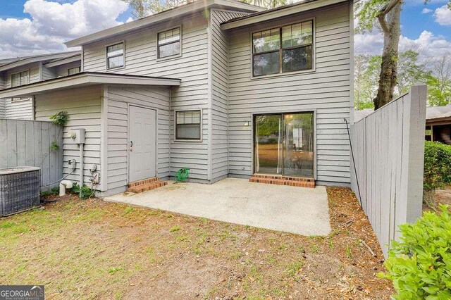 33 Hidden Lake Ct, Savannah, GA 31419 - rear view of house with a patio