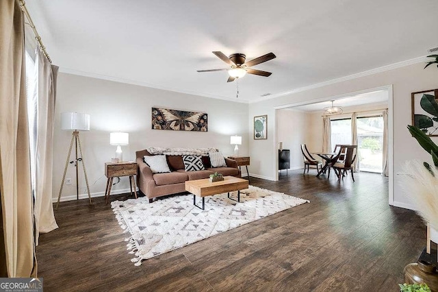 33 Hidden Lake Ct, Savannah, GA 31419 - living room featuring ceiling fan, ornamental molding, and dark wood-style flooring