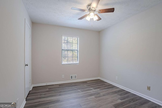 842 Brighton Dr, Lawrenceville, GA 30043 - spare room with wood finished floors, visible vents, baseboards, and ceiling fan