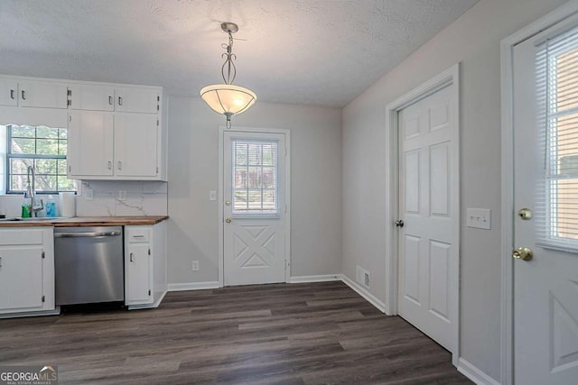 842 Brighton Dr, Lawrenceville, GA 30043 - kitchen featuring white cabinets, stainless steel dishwasher, a sink, and dark wood-style flooring