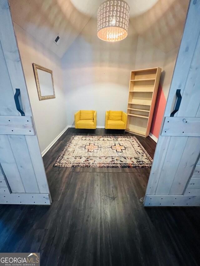 interior space featuring light wood-type flooring and baseboards