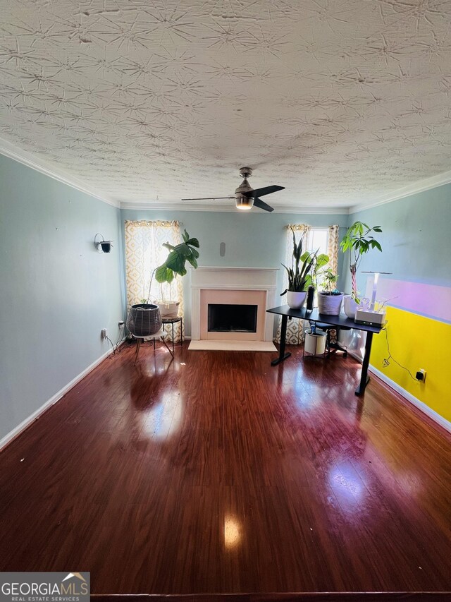 dining space with a decorative wall, wood finished floors, an inviting chandelier, a wainscoted wall, and ornamental molding