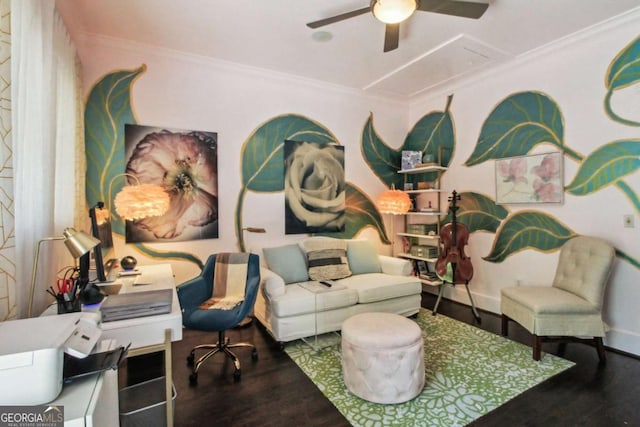 living room with attic access, wood finished floors, ceiling fan, and crown molding
