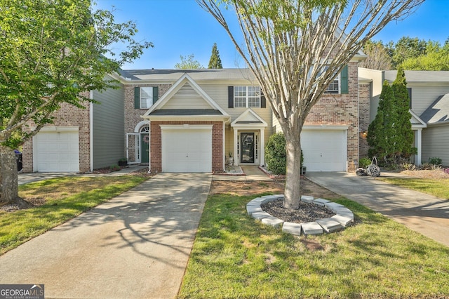 384 Parc River Blvd, Lawrenceville, GA 30046 - view of front of house with brick siding, concrete driveway, and a garage