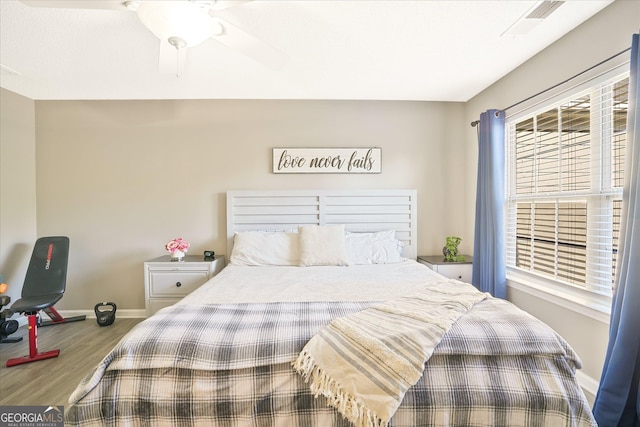 384 Parc River Blvd, Lawrenceville, GA 30046 - bedroom featuring wood finished floors, baseboards, and ceiling fan