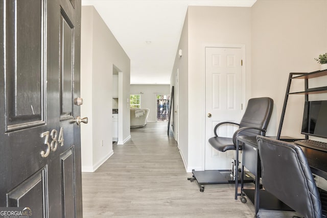 384 Parc River Blvd, Lawrenceville, GA 30046 - home office featuring light wood-type flooring and baseboards