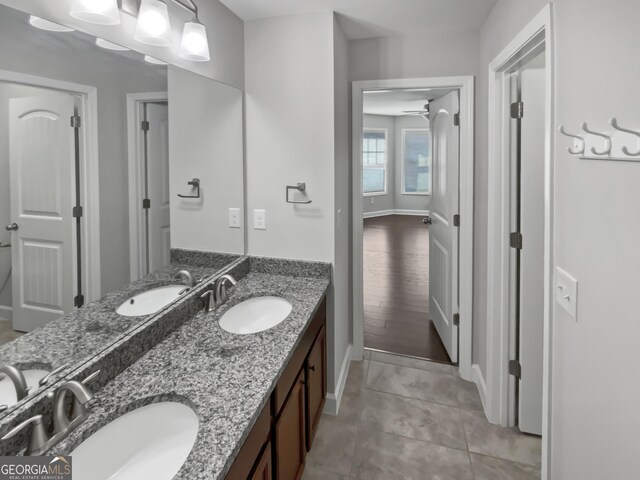2470 Bridle Bridge Trl, Cumming, GA 30040 - bathroom featuring tile patterned flooring, a sink, and double vanity