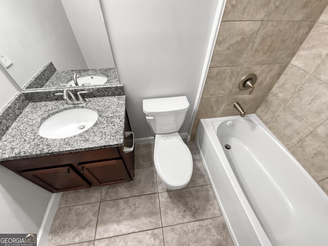 2470 Bridle Bridge Trl, Cumming, GA 30040 - full bath with tile patterned floors, baseboards, vanity, and toilet