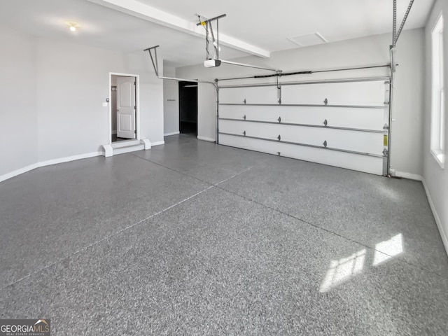2470 Bridle Bridge Trl, Cumming, GA 30040 - garage featuring baseboards