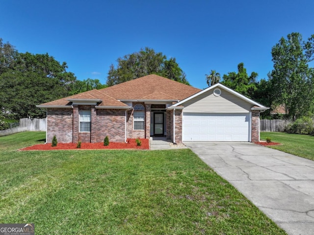 single story home with a front lawn, an attached garage, concrete driveway, and fence