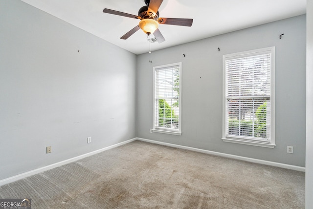 3911 Delfaire Trce, Cumming, GA 30040 - spare room featuring carpet floors, baseboards, and ceiling fan