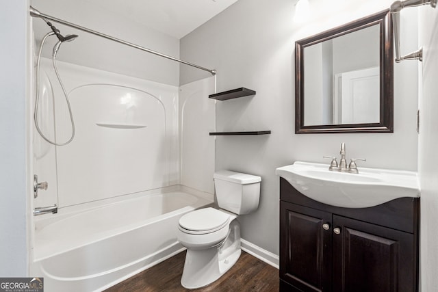 3911 Delfaire Trce, Cumming, GA 30040 - full bath featuring toilet, wood finished floors, bathing tub / shower combination, baseboards, and vanity
