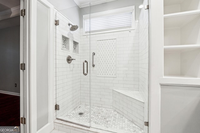 3911 Delfaire Trce, Cumming, GA 30040 - bathroom featuring a stall shower and ornamental molding