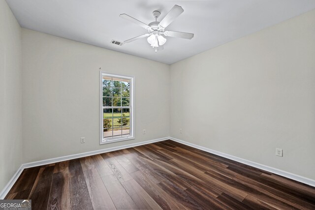 181 Bagley Rd, Eatonton, GA 31024 - unfurnished room with ceiling fan, visible vents, baseboards, and dark wood-style flooring