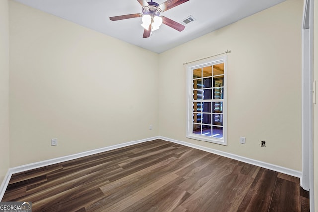181 Bagley Rd, Eatonton, GA 31024 - unfurnished room with dark wood-style floors, baseboards, ceiling fan, and visible vents