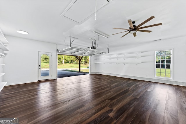 181 Bagley Rd, Eatonton, GA 31024 - unfurnished living room with attic access, baseboards, wood finished floors, and ceiling fan