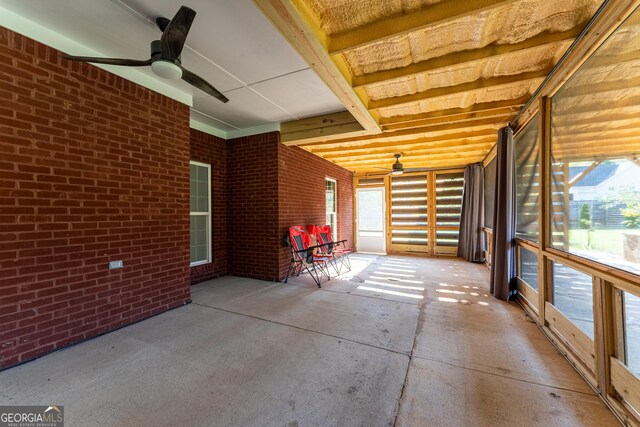 181 Bagley Rd, Eatonton, GA 31024 - unfurnished sunroom featuring ceiling fan and beam ceiling