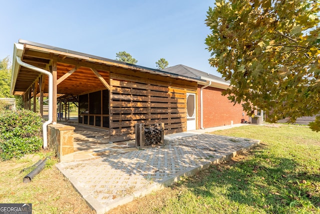 181 Bagley Rd, Eatonton, GA 31024 - exterior space featuring an exterior structure, brick siding, and an outdoor structure